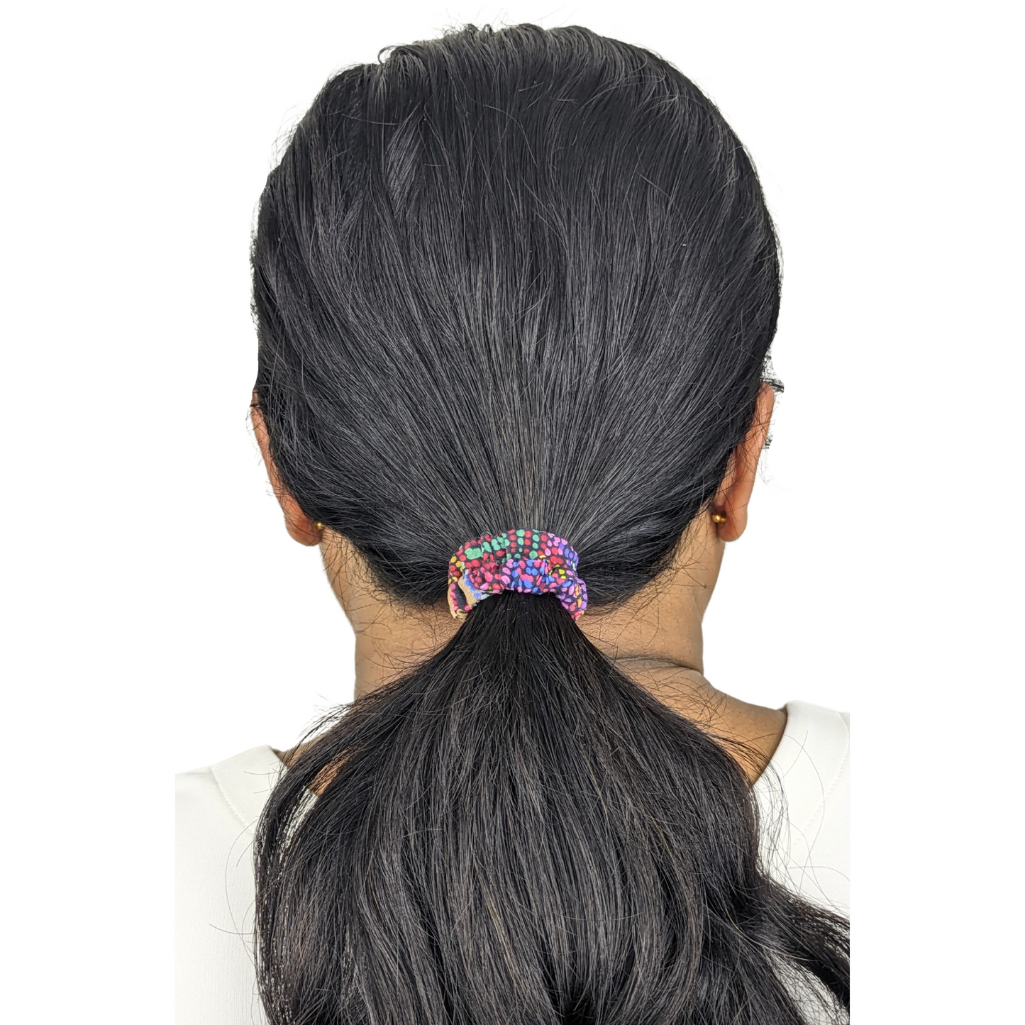 Woman wearing a Marapinti Dreaming Tiny Tie scrunchie