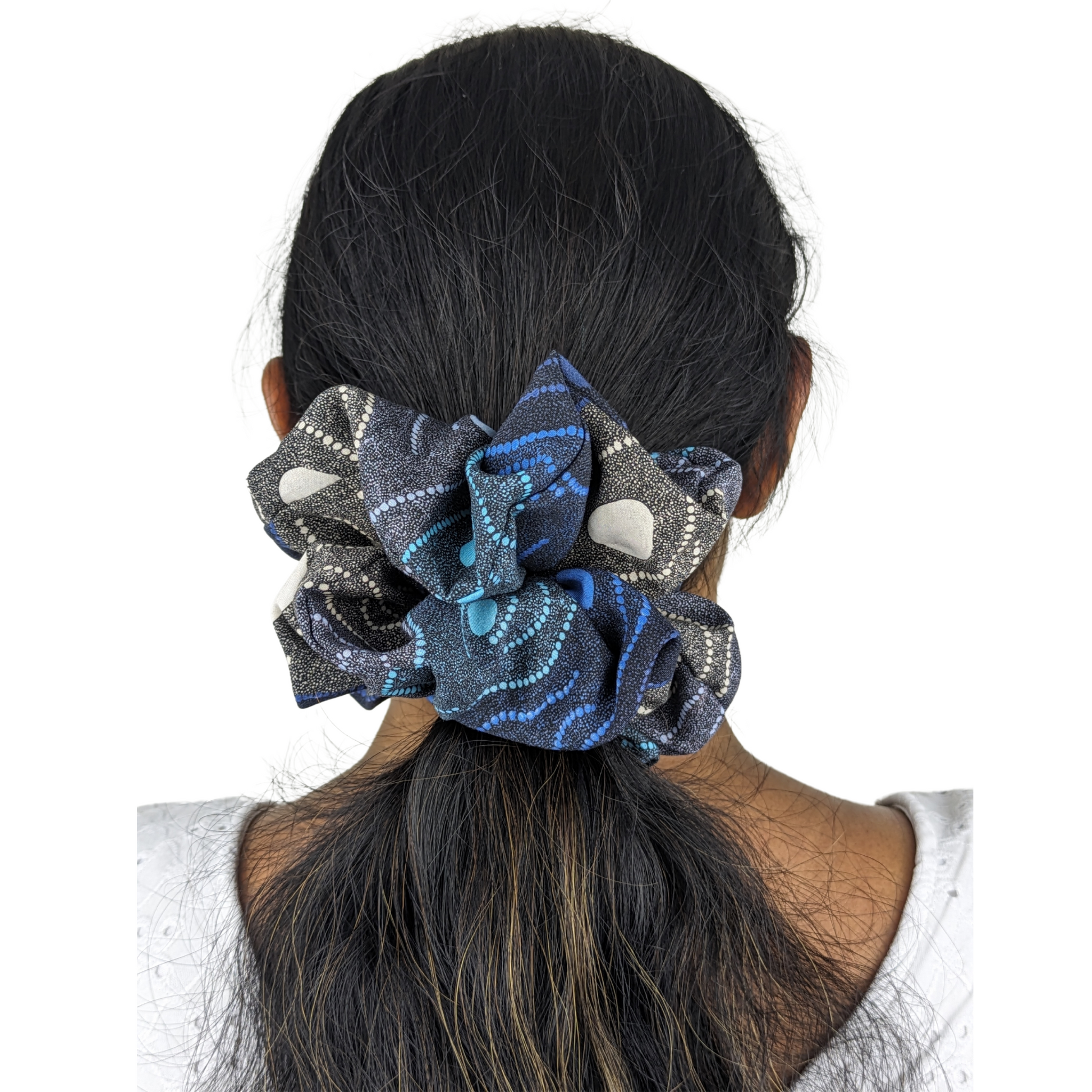 Woman wearing Blue Water Dreaming large scrunchie