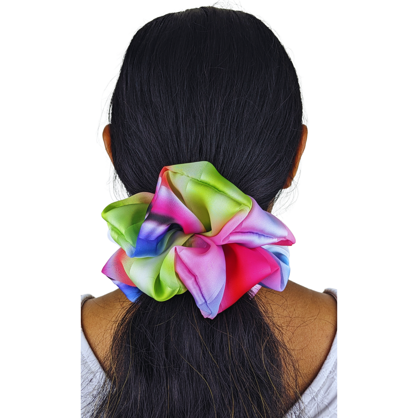 Woman wearing large colourful scrunchie made with 100% polyester satin fabric.