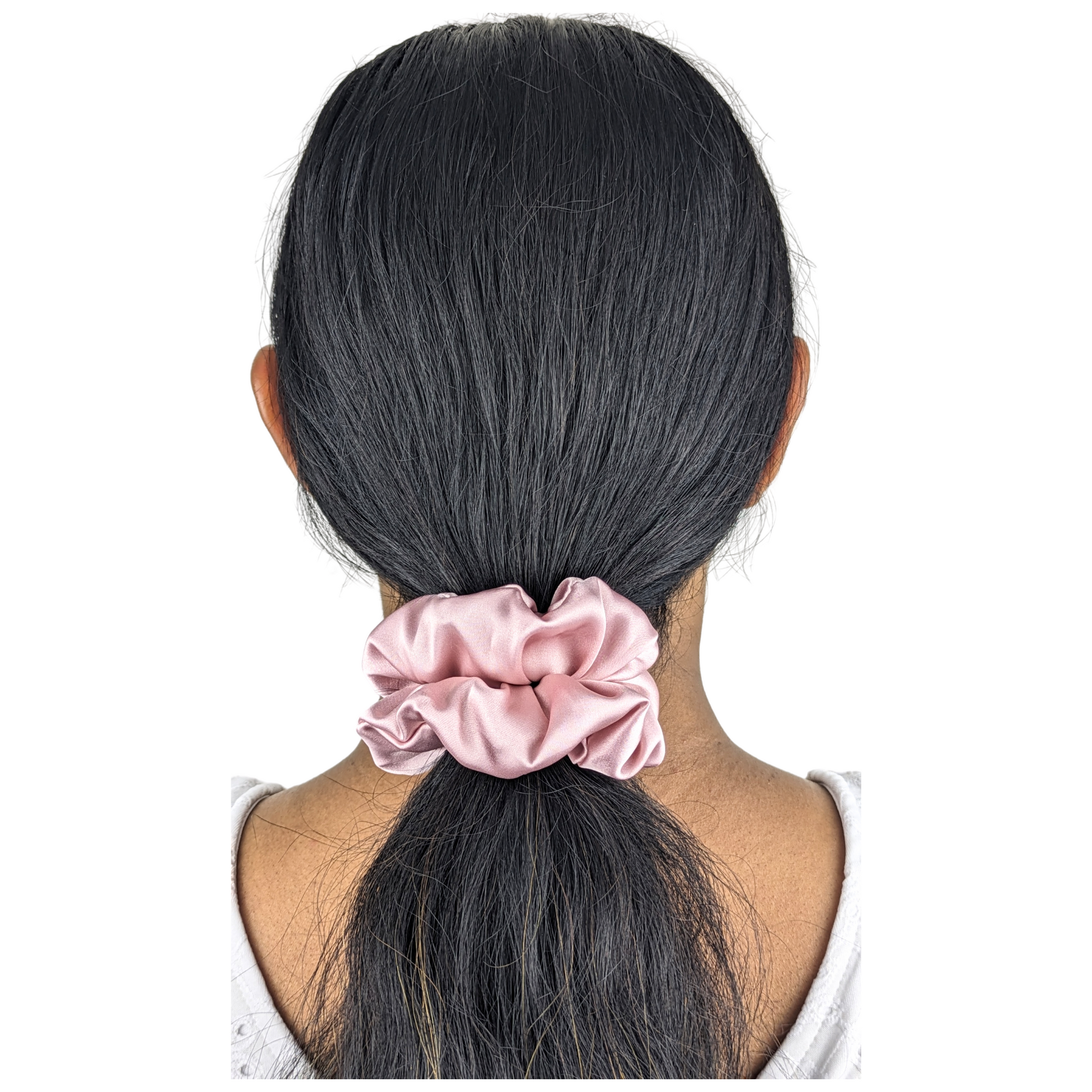 Woman wearing a Regular Opal Pink Scrunchie.