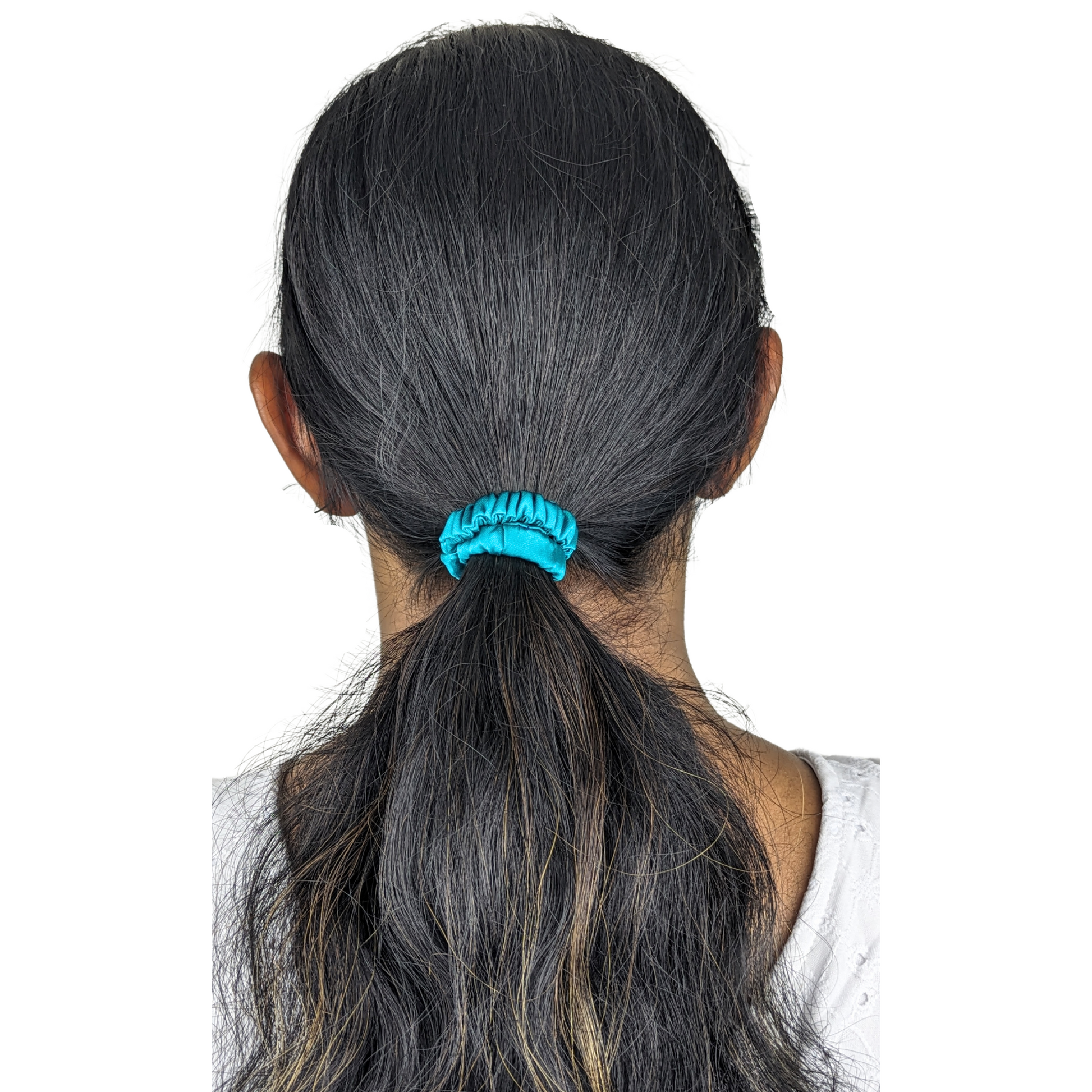 Woman wearing a Satin Teal Tiny Tie scrunchie,